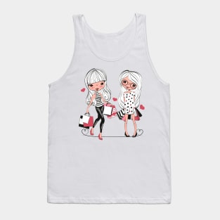 Two fashionable girls with bags from the store. Shopping. Tank Top
